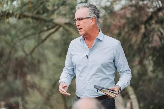Marshall Pennell speaking outdoors
